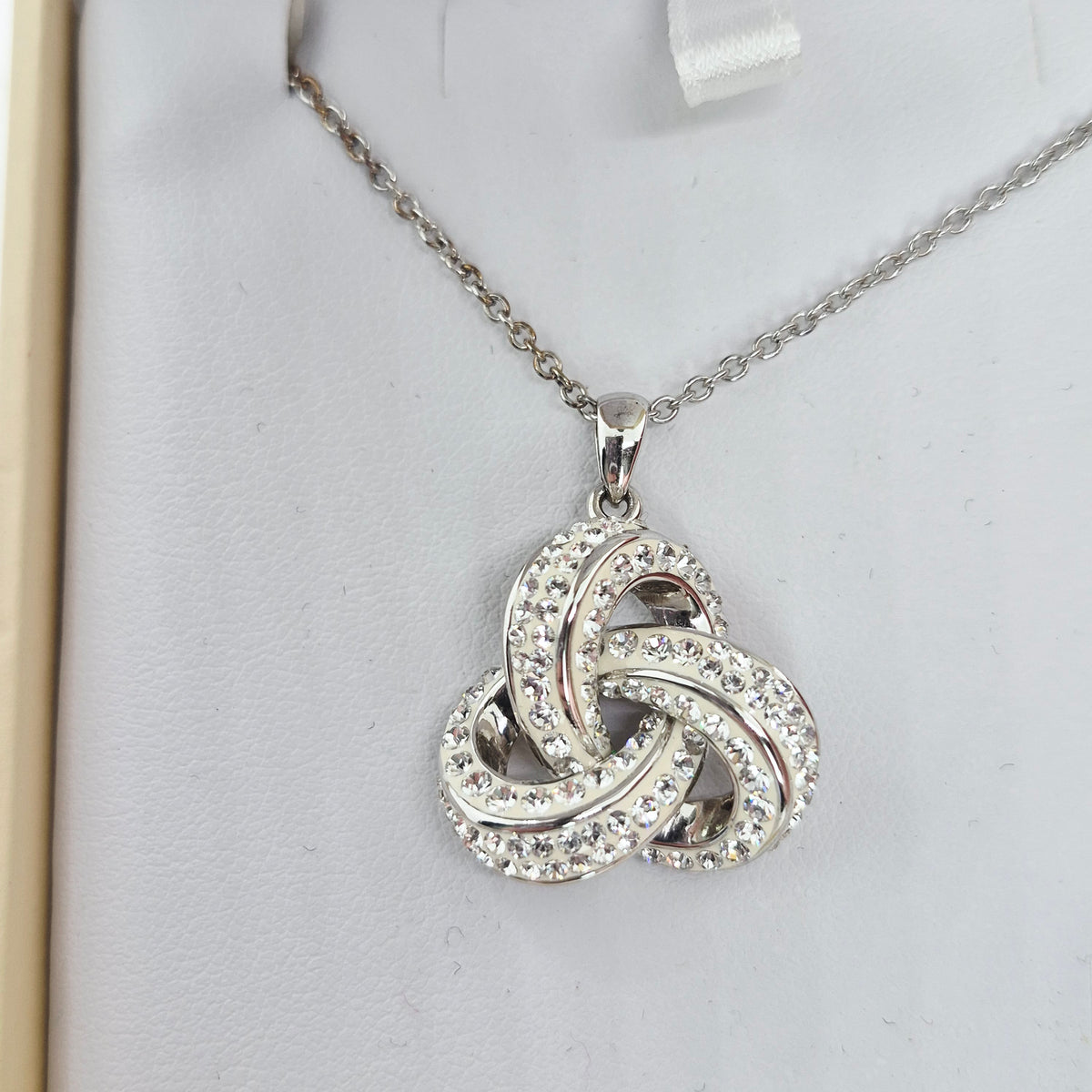 Sterling silver Swarovski Crystal Celtic Trinity knot necklace. New in box.